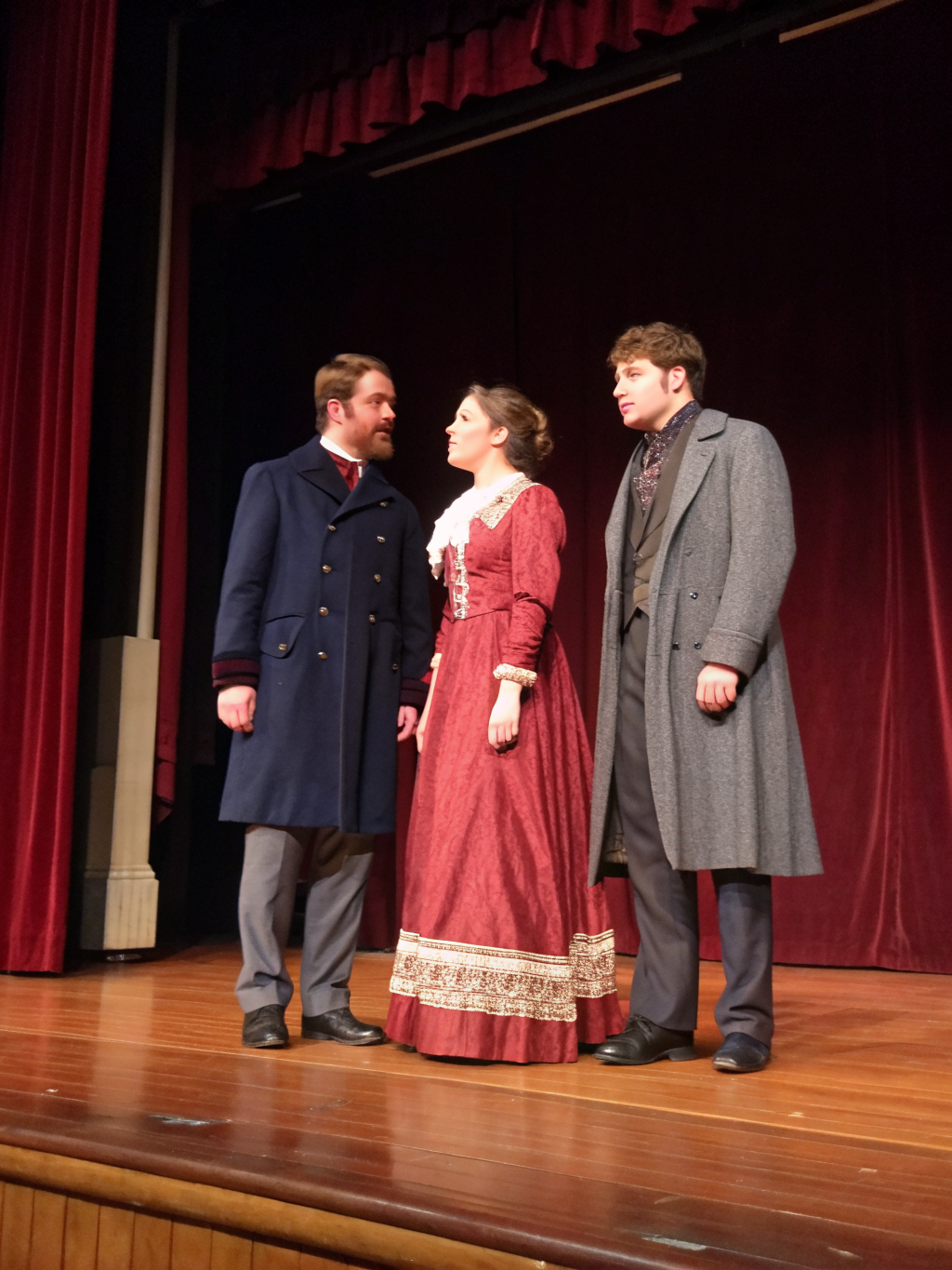 Actors on stage during a classic play